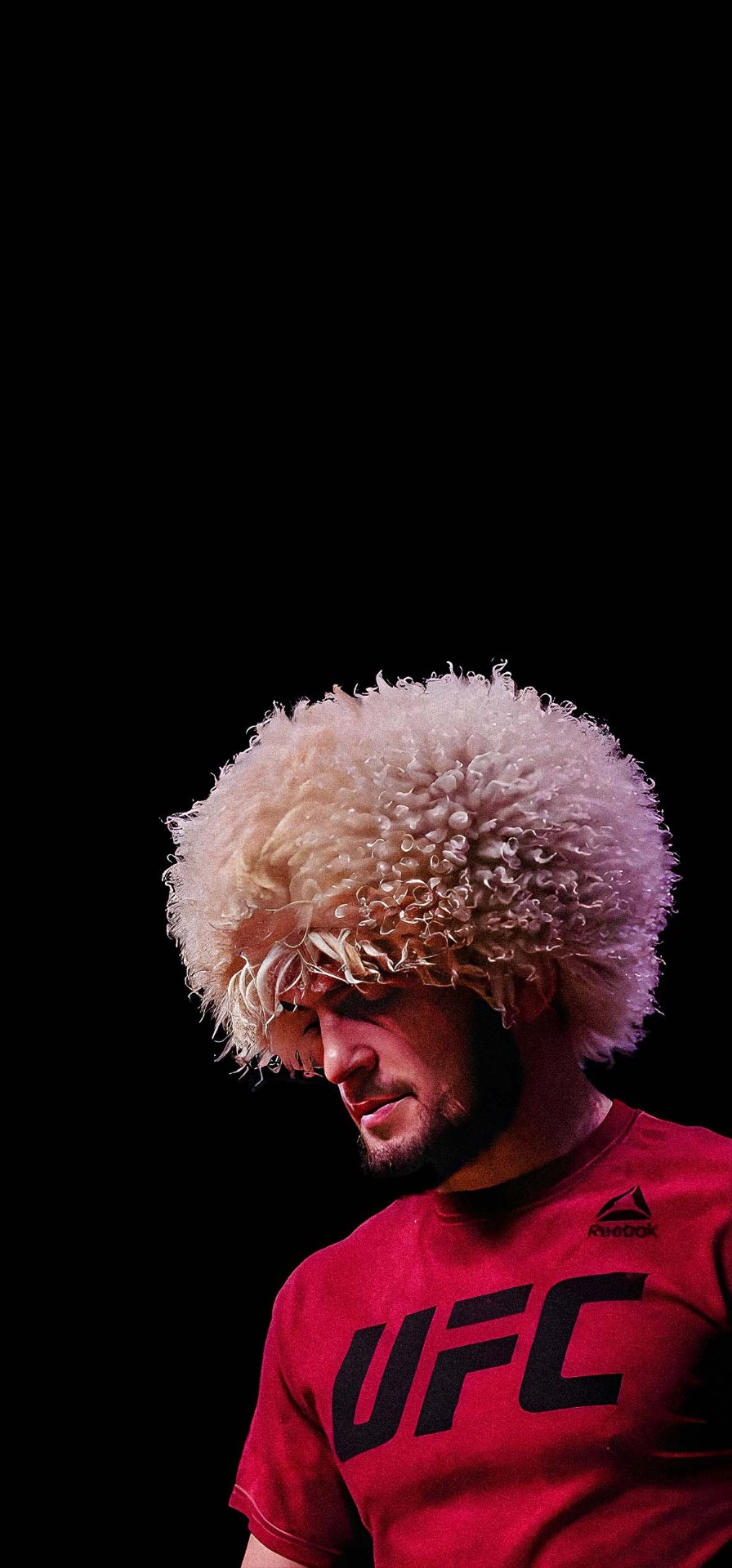 Khabib Nurmagomedov wearing a traditional Dagestani papakha